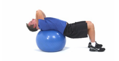 A man arching his back over an exercise ball