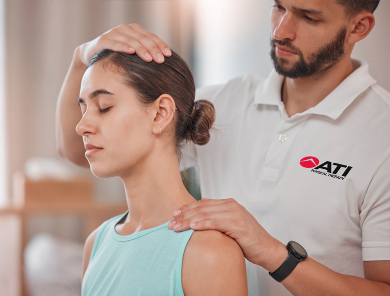 Woman receiving concussion therapy at ATI